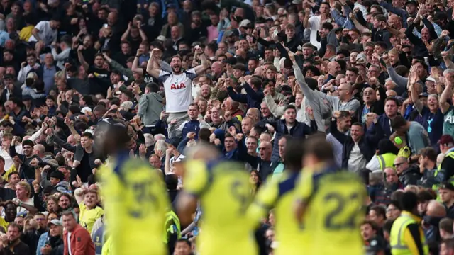 Aston Villa fans celebrate at half-time