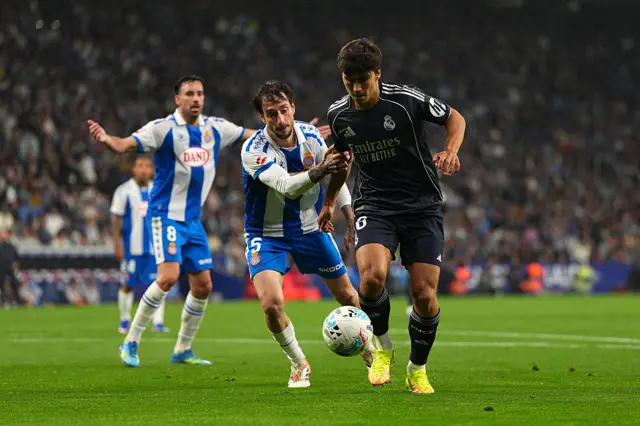 Gonzalo Garcia of Real Madrid is challenged by Fernando Calero of RCD Espanyol