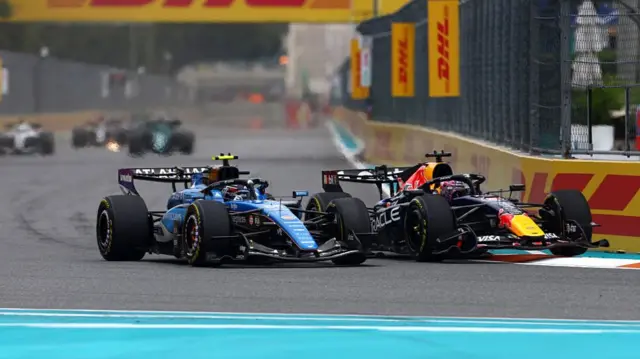 Max Verstappen and Carlos Sainz battle for track position during the F1 Grand Prix of Miami