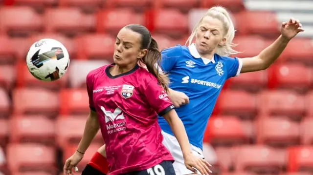 Ashley Robertson battles with Brogan Hay