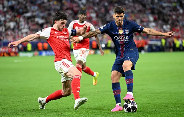 Lucas Beraldo of Paris Saint-Germain controls the ball