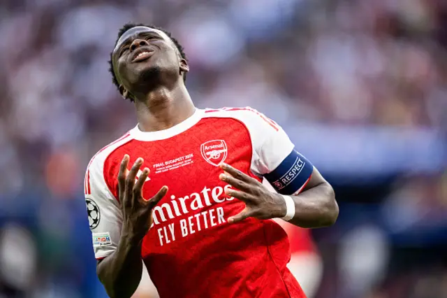 Bukayo Saka of Arsenal looks on