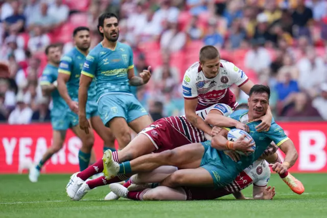Sauaso Sue of Hull KR is tackled