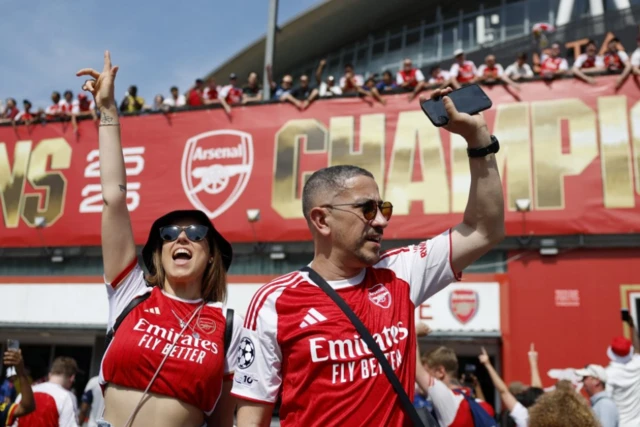 Arsenal fans in London watch the Final