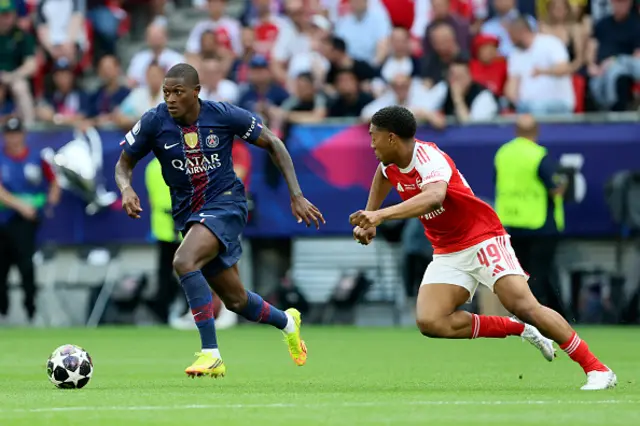 Myles Lewis-Skelly of Arsenal challenges for the ball