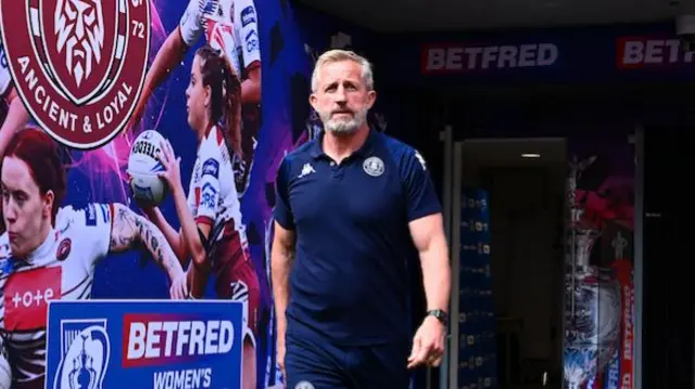 Wigan Warriors Women head coach Denis Betts walking out of the tunnel at Wembley.