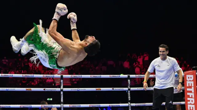 Adam Azim backflips