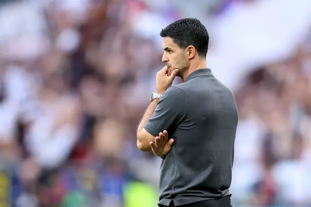 Mikel Arteta, Manager of Arsenal, looks on