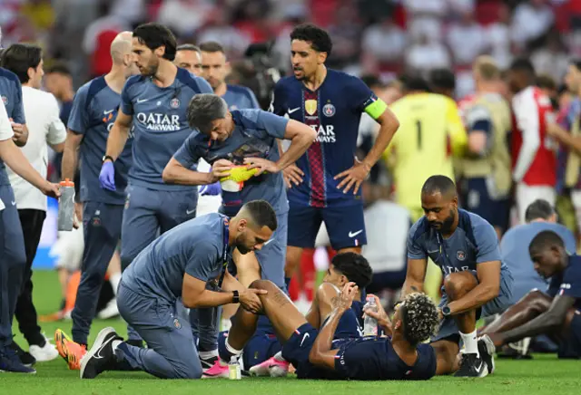 Desire Doue of Paris Saint-Germain receives medical treatment