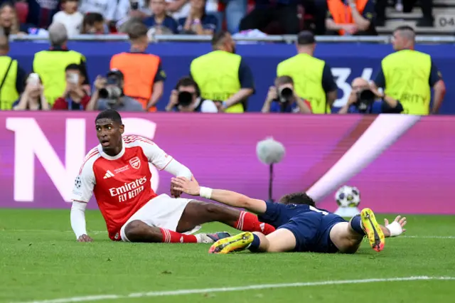 Cristhian Mosquera of Arsenal reacts after a challenge on Khvicha Kvaratskhelia