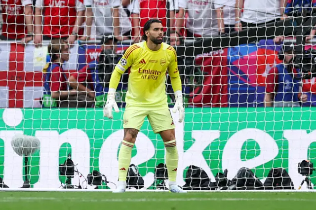 Arsenal goalkeeper David Raya looks on