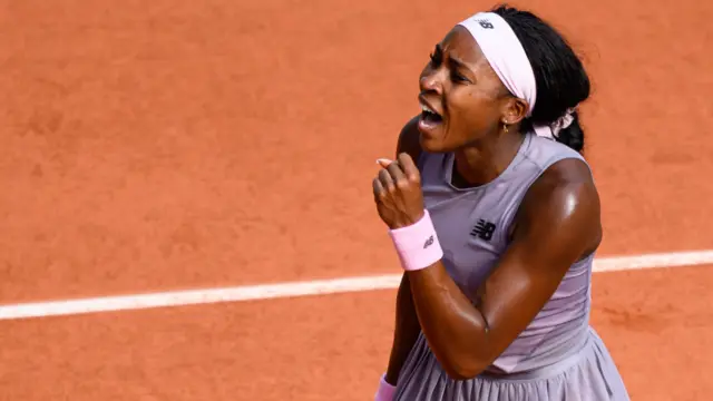 Coco Gauff celebrates with a clenched fist