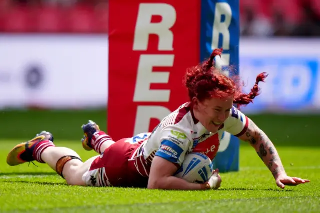 Wigan Warriors' Eva Hunter scores her fourth try