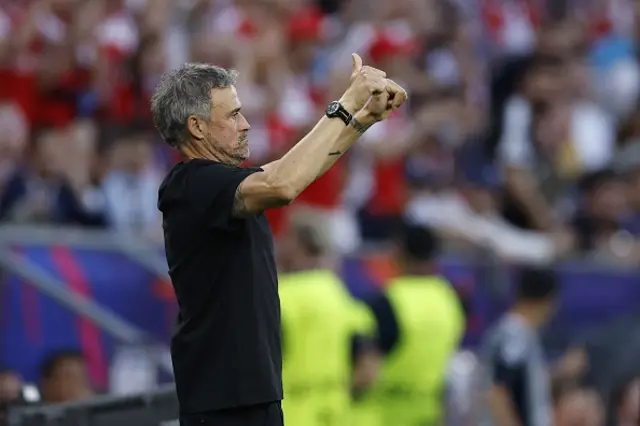 Paris Saint-Germain manager Luis Enrique looks on