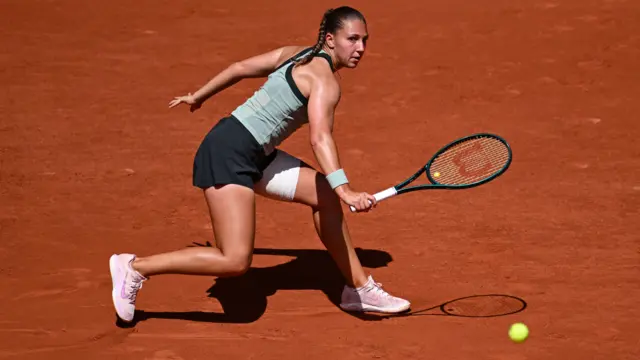 Diane Parry hits a backhand