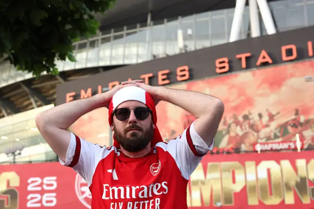 An Arsenal fan reacts