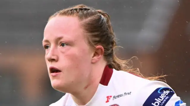 Wigan Warriors Women forward Lucie Sams in action.