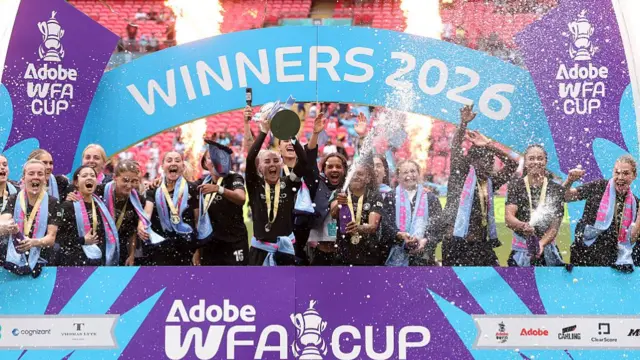 Alex Greenwood of Manchester City lifts the Women's FA Cup Trophy