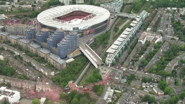 Aerial footage of Emirates Stadium as celebration buses loop back to the stadium after the victory parade