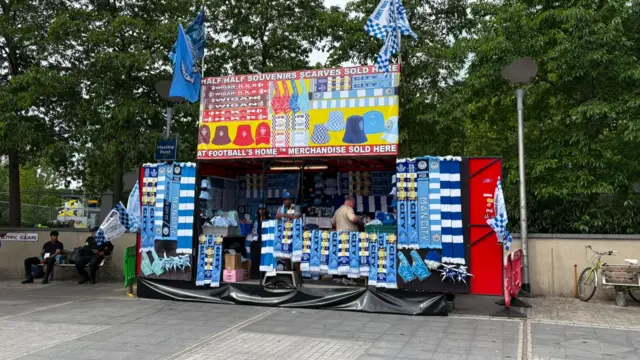 A picture of a portable merchandise stall at Wembley