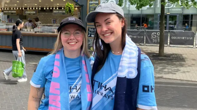 Two female Man City fans outside Wembley