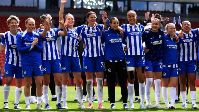 Maisie Symonds of Brighton & Hove Albion and her teammates acknowledge the fans following victory in the Adobe Women's FA Cup Semi Final match between Liverpool and Brighton