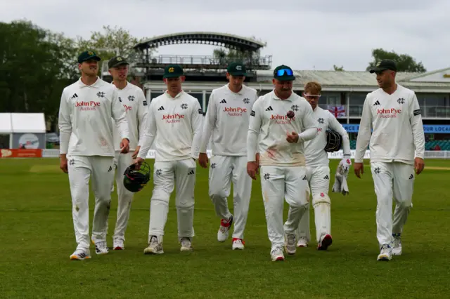 Notts players celebrate victory at Grace Road