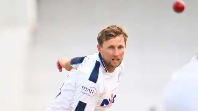 Joe Root bowling