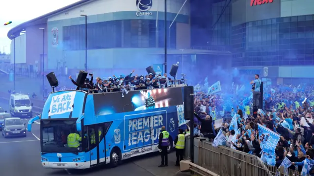 A general view of the parade bus as players acknowledges the fans outside the Coventry Building Society Arena during a victory parade in Coventry