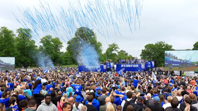 Blue and white confetti and streamers at Christchurch Park