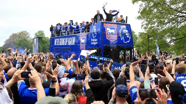 Ipswich Town bus with players and boss Kieran McKenna and chairman Mark Ashton aboard