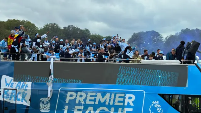 Players on top of the bus