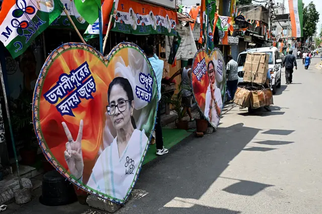 Posters featuring West Bengal chief minister and All India Trinamool Congress (TMC) party chairperson Mamata Banerjee are placed along a street leading to her residence in Kolkata on May 4, 2026 during vote counting for the West Bengal Legislative Assembly elections. Vote counting in key Indian state elections was underway on May 4 under tight security, with the focus on West Bengal, where Prime Minister Narendra Modi's party appeared set for victory. (Photo by Dibyangshu SARKAR / AFP via Getty Images)