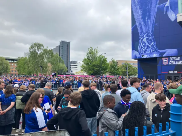 Hundreds of people gathered outside Portman Road stadium
