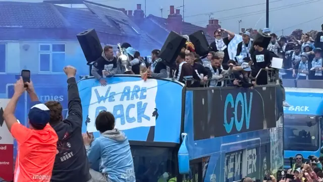 A view of the bus as fans celebrate