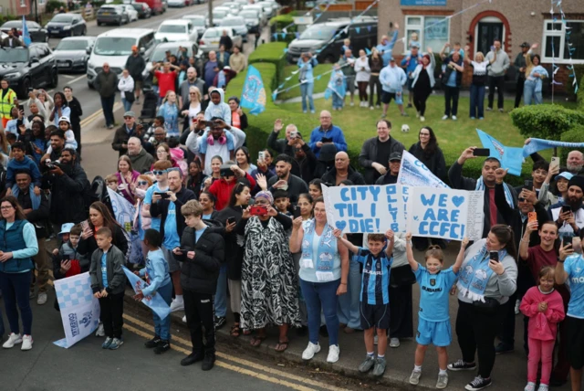 Crowds gather at the parade