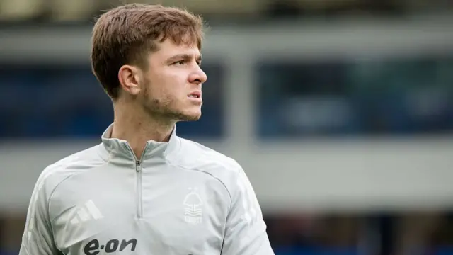 James McAtee of Nottingham Forest warming up