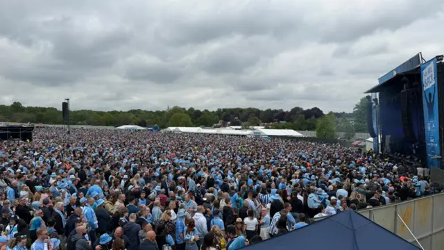 The huge mass of fans in front of the stage