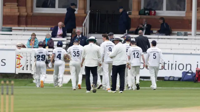 Middlesex and Durham leave the field at Lord's