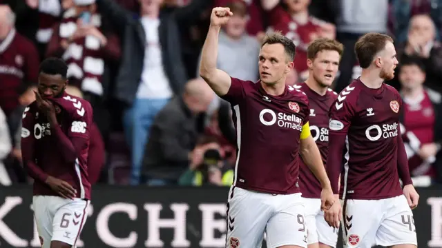 Hearts players celebrate a goal
