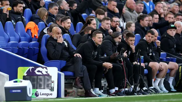Pep Guardiola in the dugout