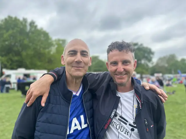 Two men stand side-by-side in Ipswich shirts
