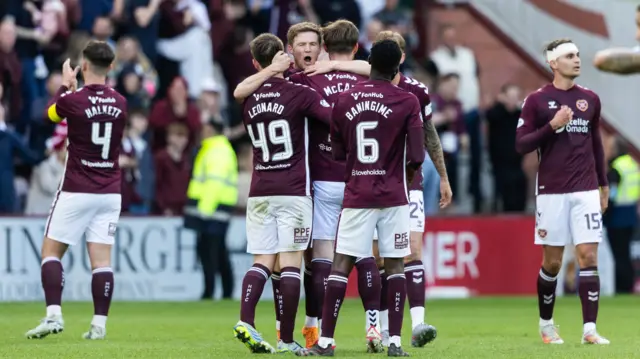 Hearts players celebrate at full time