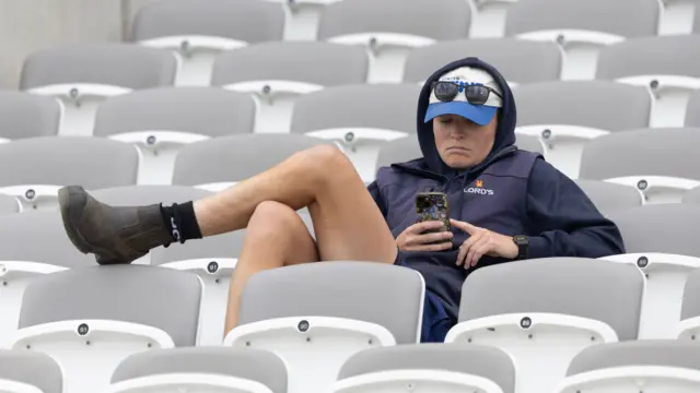Groundswoman sits in the stand at Lord's