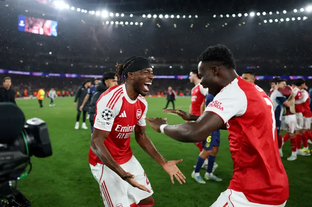 Noni Madueke and Bykayo Saka celebrate