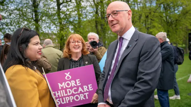 John Swinney with party activists in Edinburgh