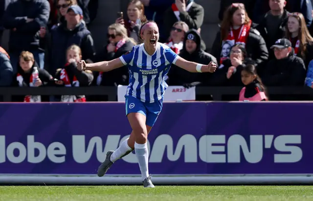 Caitlyn Hayes of Brighton & Hove Albion celebrates