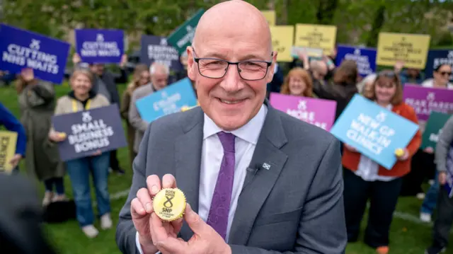 John Swinney with party activists in Edinburgh