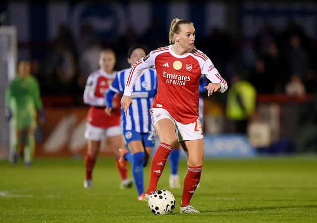 Blackstenius drives forward with the ball