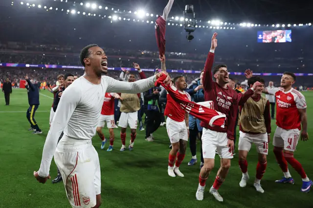 Gabriel of Arsenal celebrates with team mates